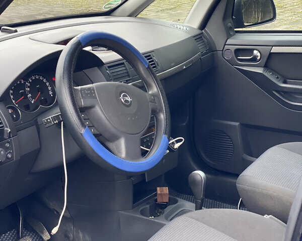 Синий Опель Мерива, объемом двигателя 1.6 л и пробегом 101 тыс. км за 4850 $, фото 24 на Automoto.ua