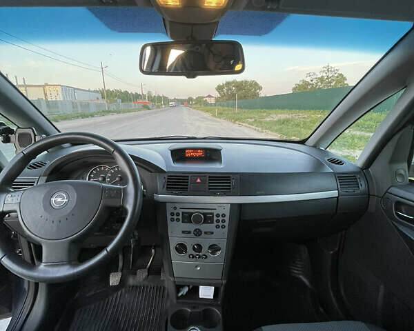 Синий Опель Мерива, объемом двигателя 1.69 л и пробегом 262 тыс. км за 3550 $, фото 21 на Automoto.ua