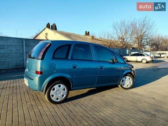 Синий Опель Мерива, объемом двигателя 1.6 л и пробегом 142 тыс. км за 4850 $, фото 13 на Automoto.ua