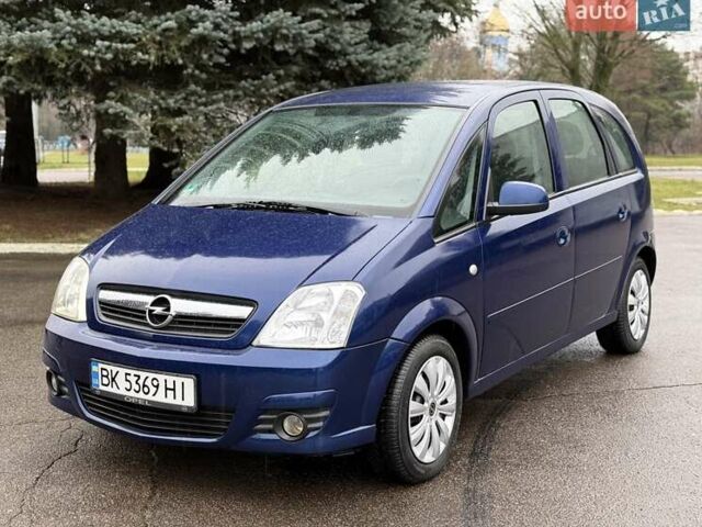 Синий Опель Мерива, объемом двигателя 1.6 л и пробегом 142 тыс. км за 3950 $, фото 1 на Automoto.ua