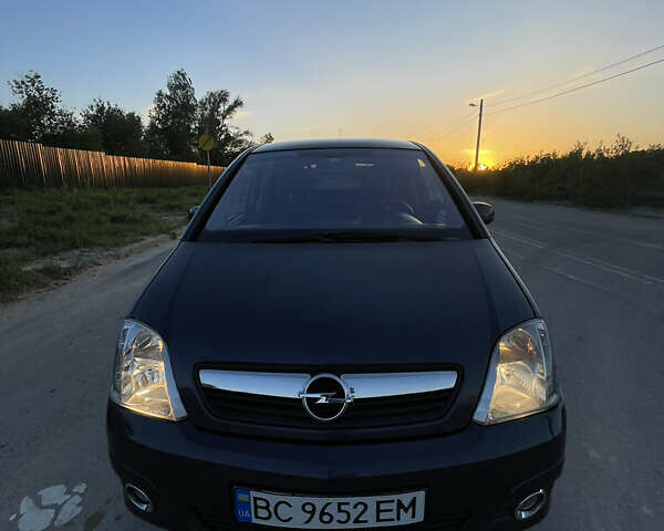 Синий Опель Мерива, объемом двигателя 1.69 л и пробегом 262 тыс. км за 3550 $, фото 6 на Automoto.ua