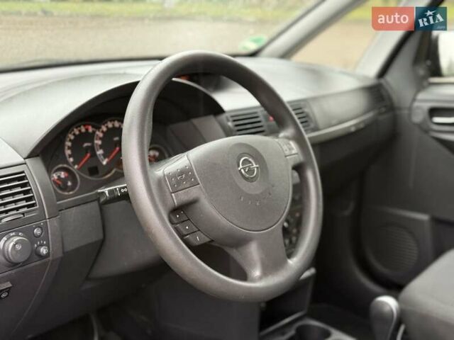 Синий Опель Мерива, объемом двигателя 1.6 л и пробегом 142 тыс. км за 3950 $, фото 66 на Automoto.ua