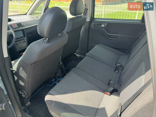 Синий Опель Мерива, объемом двигателя 1.6 л и пробегом 300 тыс. км за 3500 $, фото 9 на Automoto.ua