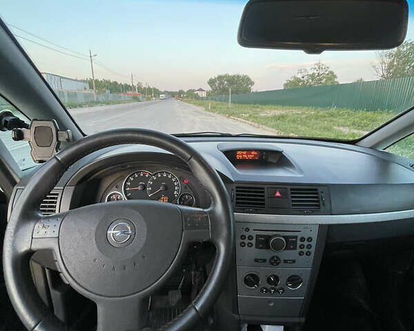 Синий Опель Мерива, объемом двигателя 1.69 л и пробегом 262 тыс. км за 3550 $, фото 32 на Automoto.ua