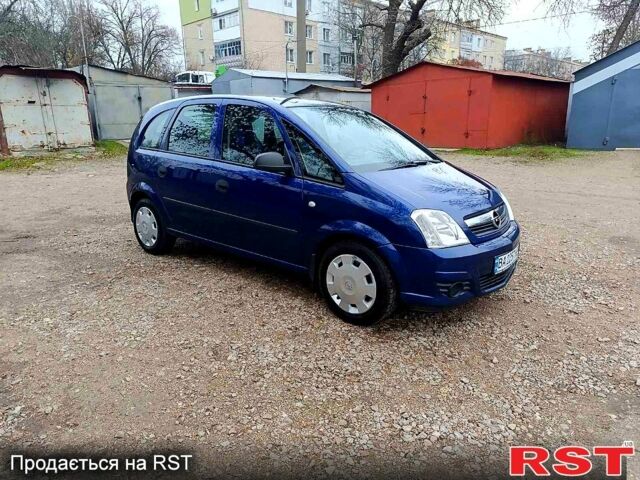Синий Опель Мерива, объемом двигателя 1.4 л и пробегом 205 тыс. км за 4750 $, фото 2 на Automoto.ua