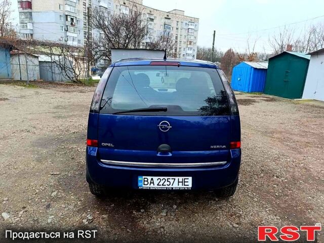 Синий Опель Мерива, объемом двигателя 1.4 л и пробегом 205 тыс. км за 4750 $, фото 5 на Automoto.ua