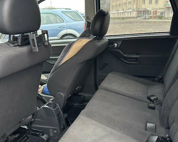 Синий Опель Мерива, объемом двигателя 1.36 л и пробегом 164 тыс. км за 5000 $, фото 8 на Automoto.ua