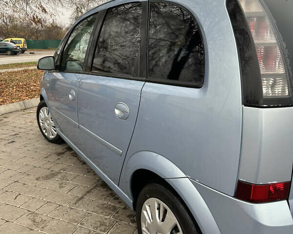 Синий Опель Мерива, объемом двигателя 1.36 л и пробегом 164 тыс. км за 5000 $, фото 4 на Automoto.ua