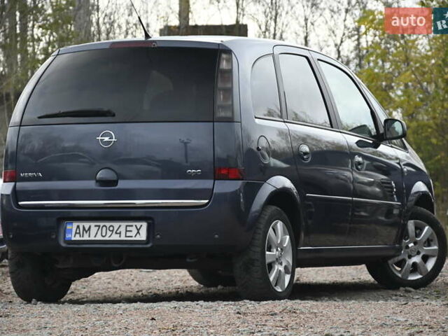 Синий Опель Мерива, объемом двигателя 1.6 л и пробегом 268 тыс. км за 3999 $, фото 12 на Automoto.ua