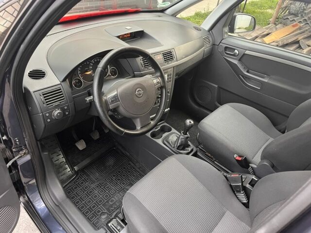 Опель Мерива 2009 в Житомире на Automoto.ua Синий Опель Мерива, объемом двигателя 1.4 л и пробегом 214 тыс. км за 4699 $, фото 16 на Automoto.ua