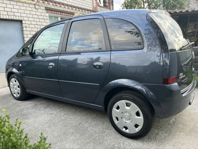 Опель Мерива 2009 в Житомире на Automoto.ua Синий Опель Мерива, объемом двигателя 1.4 л и пробегом 214 тыс. км за 4699 $, фото 5 на Automoto.ua