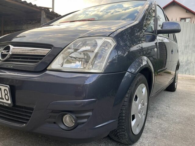 Опель Мерива 2009 в Житомире на Automoto.ua Синий Опель Мерива, объемом двигателя 1.4 л и пробегом 214 тыс. км за 4699 $, фото 10 на Automoto.ua