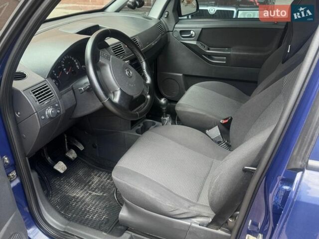 Синий Опель Мерива, объемом двигателя 1.36 л и пробегом 195 тыс. км за 4500 $, фото 4 на Automoto.ua