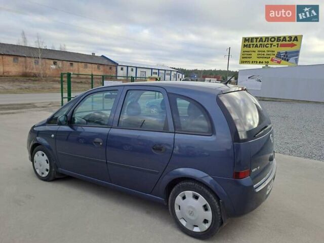Синий Опель Мерива, объемом двигателя 1.36 л и пробегом 202 тыс. км за 4350 $, фото 7 на Automoto.ua
