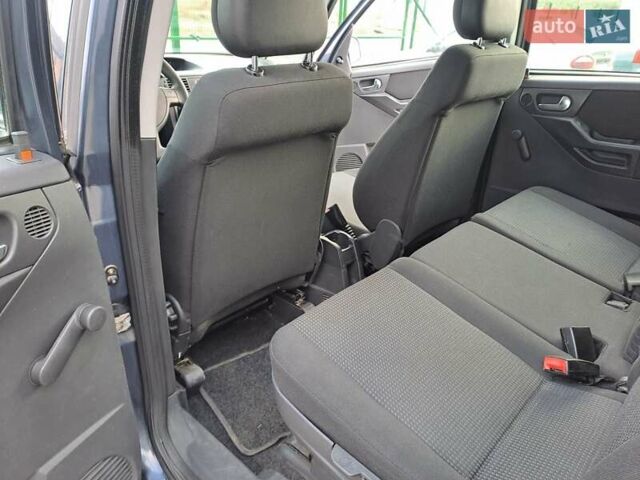 Синий Опель Мерива, объемом двигателя 1.36 л и пробегом 202 тыс. км за 4350 $, фото 17 на Automoto.ua