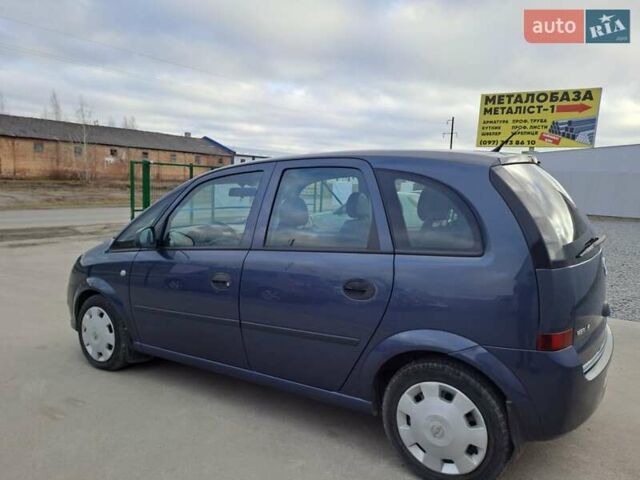 Синий Опель Мерива, объемом двигателя 1.36 л и пробегом 202 тыс. км за 4350 $, фото 13 на Automoto.ua