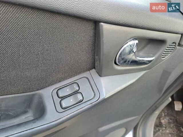 Синий Опель Мерива, объемом двигателя 1.36 л и пробегом 202 тыс. км за 4350 $, фото 25 на Automoto.ua