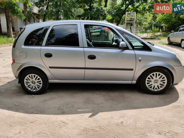 Синий Опель Мерива, объемом двигателя 1.6 л и пробегом 296 тыс. км за 3600 $, фото 8 на Automoto.ua