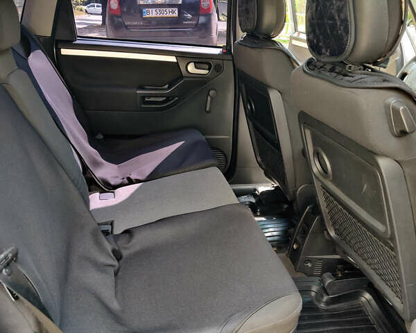 Синий Опель Мерива, объемом двигателя 1.6 л и пробегом 296 тыс. км за 3600 $, фото 5 на Automoto.ua