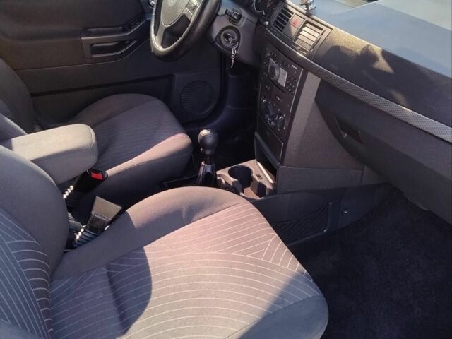 Синий Опель Мерива, объемом двигателя 1.6 л и пробегом 224 тыс. км за 3200 $, фото 12 на Automoto.ua