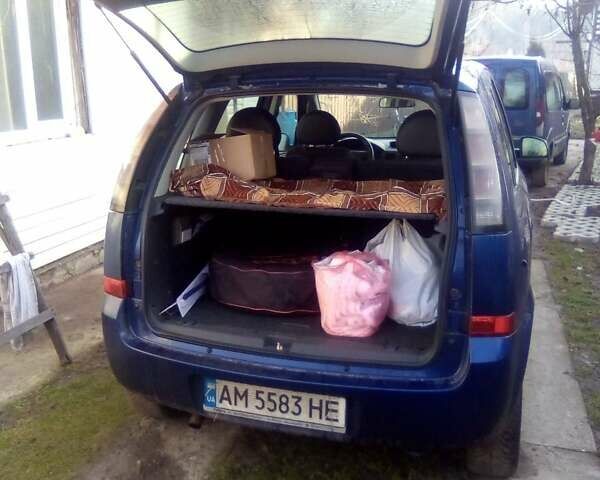 Синий Опель Мерива, объемом двигателя 1.36 л и пробегом 243 тыс. км за 4500 $, фото 5 на Automoto.ua