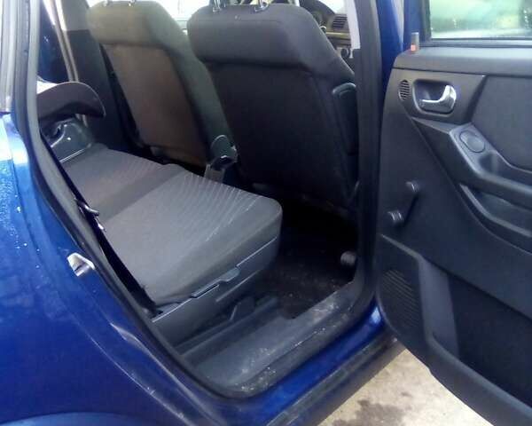 Синий Опель Мерива, объемом двигателя 1.36 л и пробегом 243 тыс. км за 4500 $, фото 4 на Automoto.ua