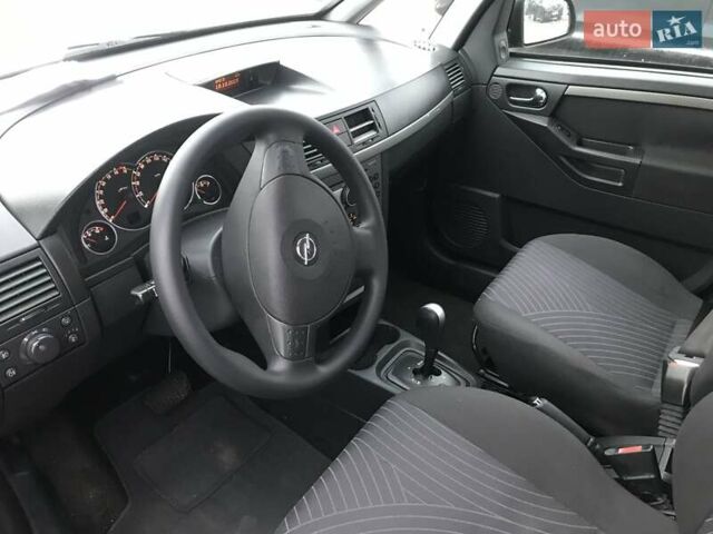 Синий Опель Мерива, объемом двигателя 1.6 л и пробегом 219 тыс. км за 4999 $, фото 4 на Automoto.ua