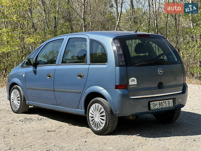 Синий Опель Мерива, объемом двигателя 1.6 л и пробегом 156 тыс. км за 4099 $, фото 5 на Automoto.ua