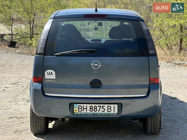 Синий Опель Мерива, объемом двигателя 1.6 л и пробегом 156 тыс. км за 4099 $, фото 4 на Automoto.ua