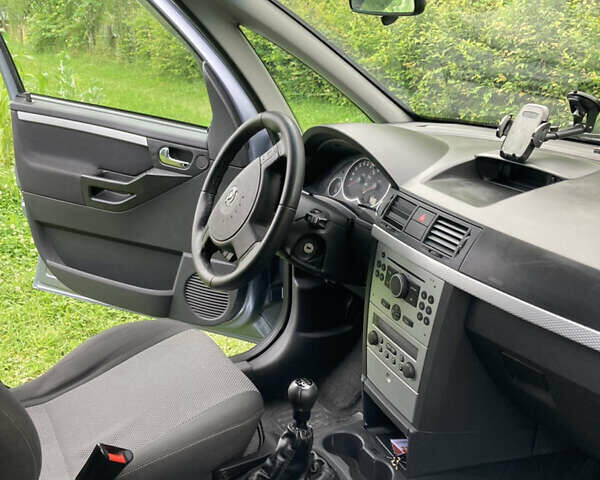 Синий Опель Мерива, объемом двигателя 1.6 л и пробегом 153 тыс. км за 5800 $, фото 6 на Automoto.ua