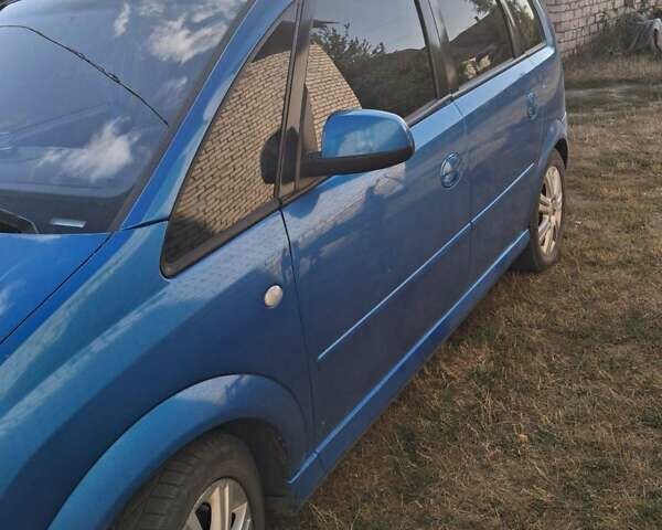 Синий Опель Мерива, объемом двигателя 1.6 л и пробегом 190 тыс. км за 5000 $, фото 4 на Automoto.ua