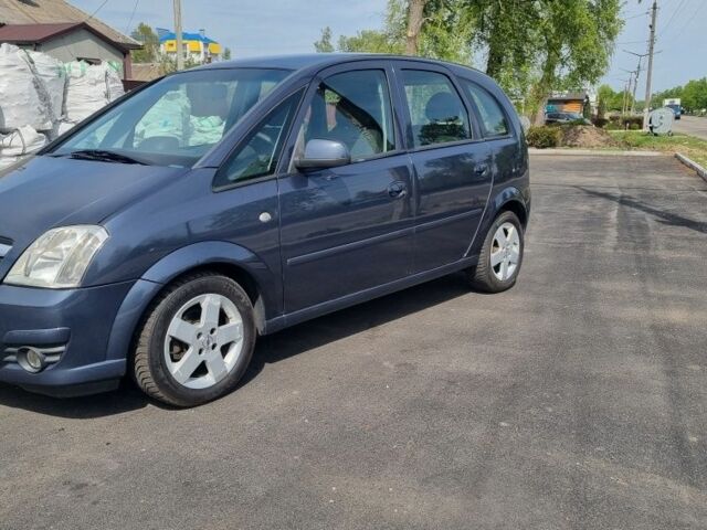 Синий Опель Мерива, объемом двигателя 0 л и пробегом 200 тыс. км за 5600 $, фото 1 на Automoto.ua