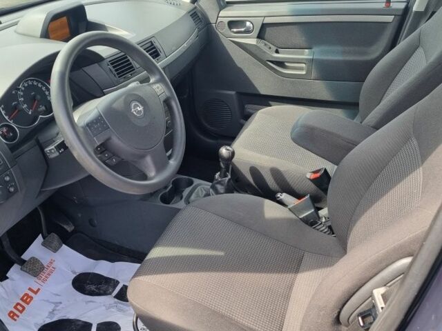 Синий Опель Мерива, объемом двигателя 0 л и пробегом 200 тыс. км за 5600 $, фото 9 на Automoto.ua