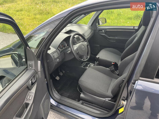 Синий Опель Мерива, объемом двигателя 1.4 л и пробегом 214 тыс. км за 4950 $, фото 12 на Automoto.ua