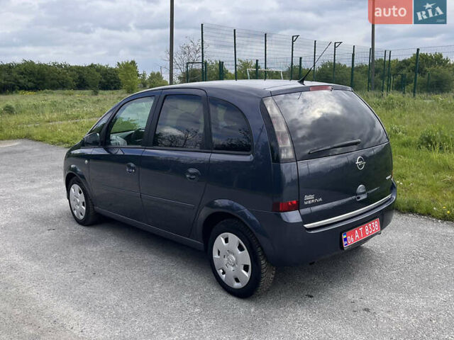 Синий Опель Мерива, объемом двигателя 1.4 л и пробегом 214 тыс. км за 4950 $, фото 4 на Automoto.ua