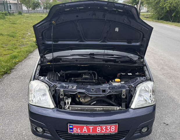 Синий Опель Мерива, объемом двигателя 1.4 л и пробегом 214 тыс. км за 4950 $, фото 30 на Automoto.ua