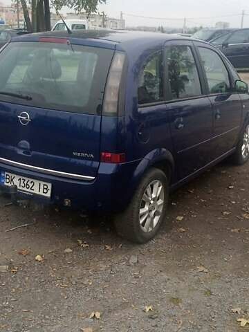 Опель Мерива 2009 в Ровно на Automoto.ua Синий Опель Мерива, объемом двигателя 1.6 л и пробегом 283 тыс. км за 4650 $, фото 33 на Automoto.ua