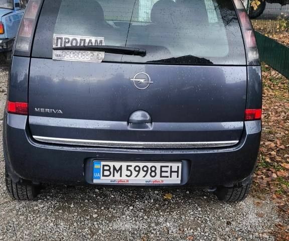 Синий Опель Мерива, объемом двигателя 1.6 л и пробегом 190 тыс. км за 4900 $, фото 4 на Automoto.ua