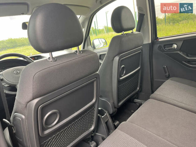 Синий Опель Мерива, объемом двигателя 1.4 л и пробегом 214 тыс. км за 4950 $, фото 22 на Automoto.ua