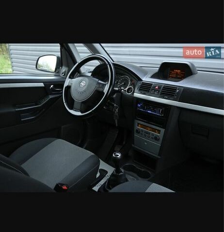 Синий Опель Мерива, объемом двигателя 1.6 л и пробегом 260 тыс. км за 3999 $, фото 2 на Automoto.ua