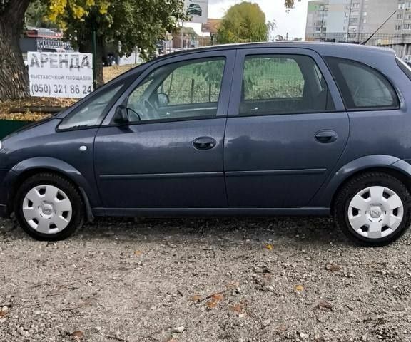 Синий Опель Мерива, объемом двигателя 1.6 л и пробегом 190 тыс. км за 4900 $, фото 5 на Automoto.ua