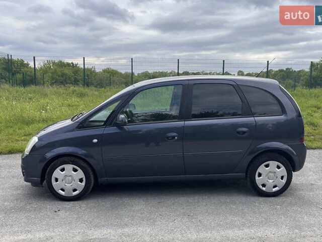 Синий Опель Мерива, объемом двигателя 1.4 л и пробегом 214 тыс. км за 4950 $, фото 3 на Automoto.ua