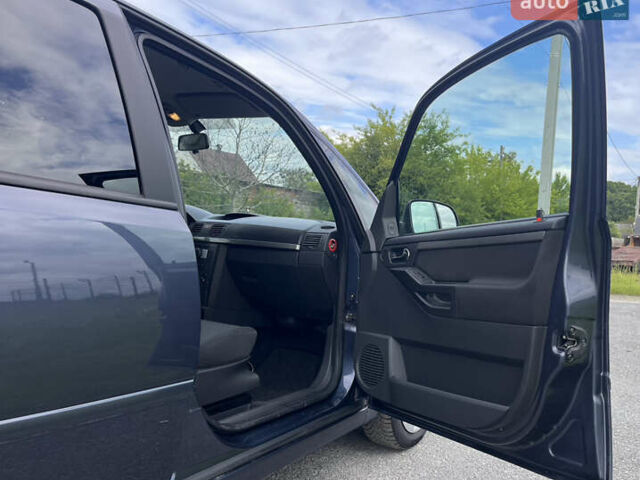 Синий Опель Мерива, объемом двигателя 1.4 л и пробегом 214 тыс. км за 4950 $, фото 15 на Automoto.ua