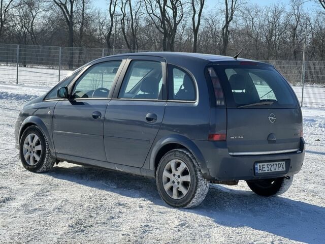 Синий Опель Мерива, объемом двигателя 1.2 л и пробегом 173 тыс. км за 5500 $, фото 2 на Automoto.ua