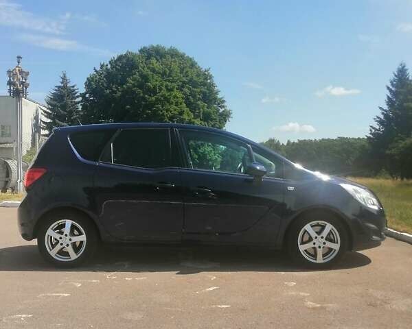 Синий Опель Мерива, объемом двигателя 1.69 л и пробегом 225 тыс. км за 5699 $, фото 3 на Automoto.ua