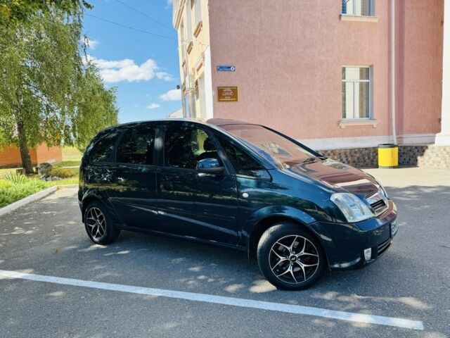 Зеленый Опель Мерива, объемом двигателя 1.6 л и пробегом 107 тыс. км за 4500 $, фото 5 на Automoto.ua