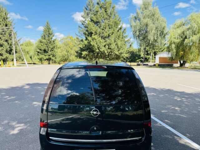 Зеленый Опель Мерива, объемом двигателя 1.6 л и пробегом 107 тыс. км за 4500 $, фото 3 на Automoto.ua