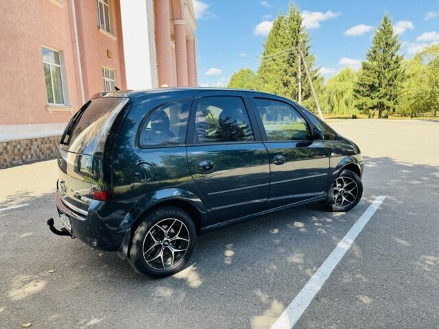 Зеленый Опель Мерива, объемом двигателя 1.6 л и пробегом 107 тыс. км за 4500 $, фото 7 на Automoto.ua