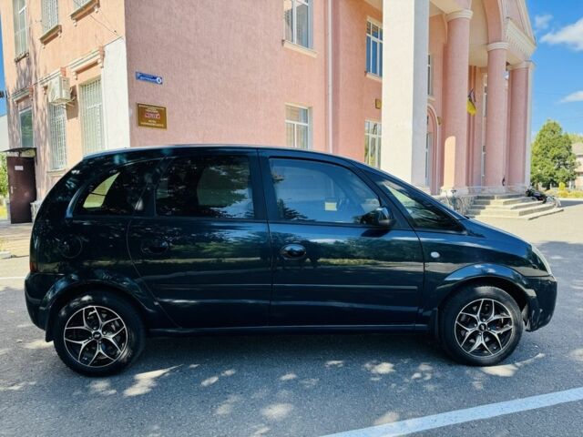 Зеленый Опель Мерива, объемом двигателя 1.6 л и пробегом 107 тыс. км за 4500 $, фото 6 на Automoto.ua