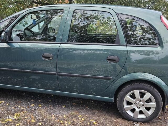 Зеленый Опель Мерива, объемом двигателя 1.6 л и пробегом 320 тыс. км за 5500 $, фото 1 на Automoto.ua